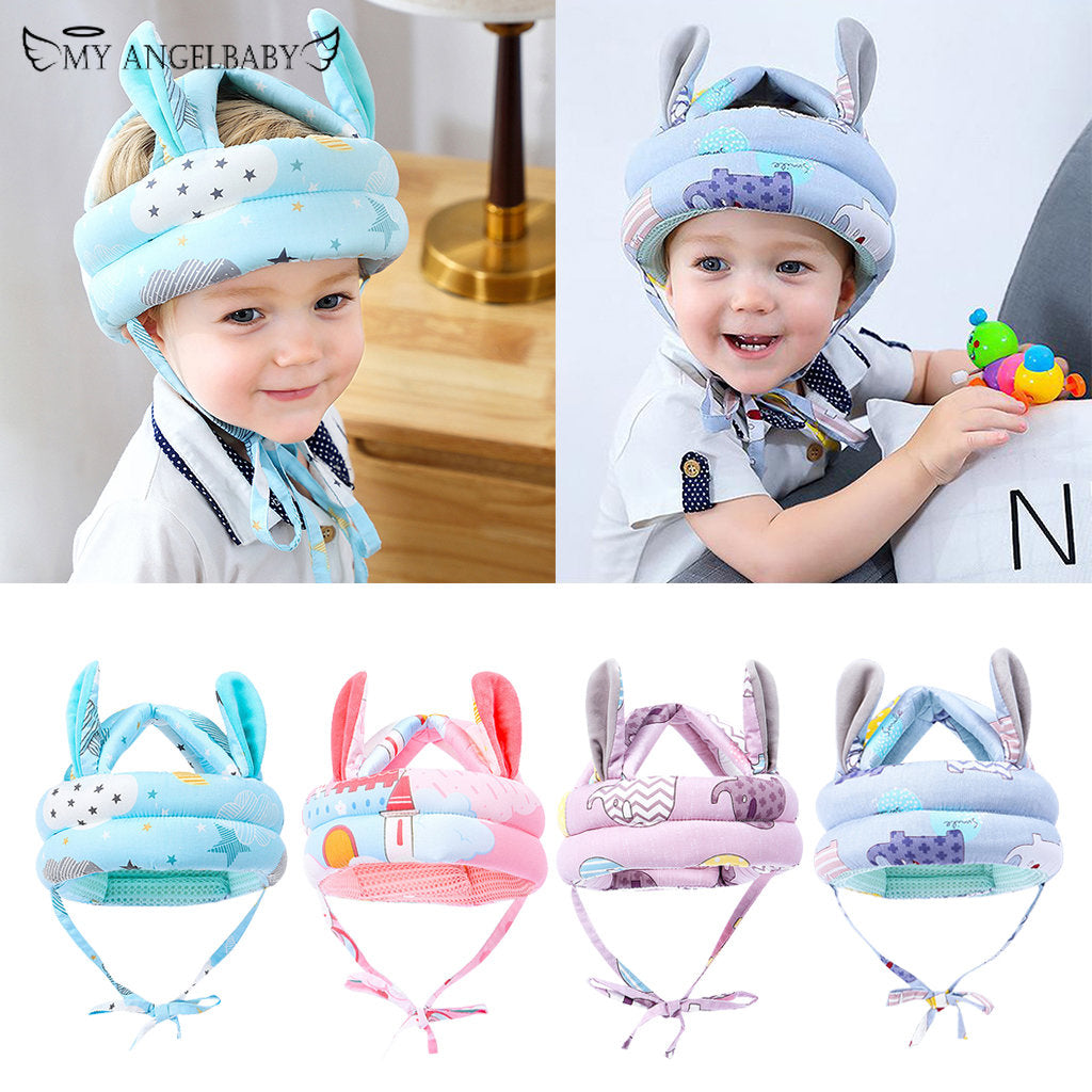 Children wearing baby safety helmets with cartoon designs, featuring the brand 'My Angel Baby'.