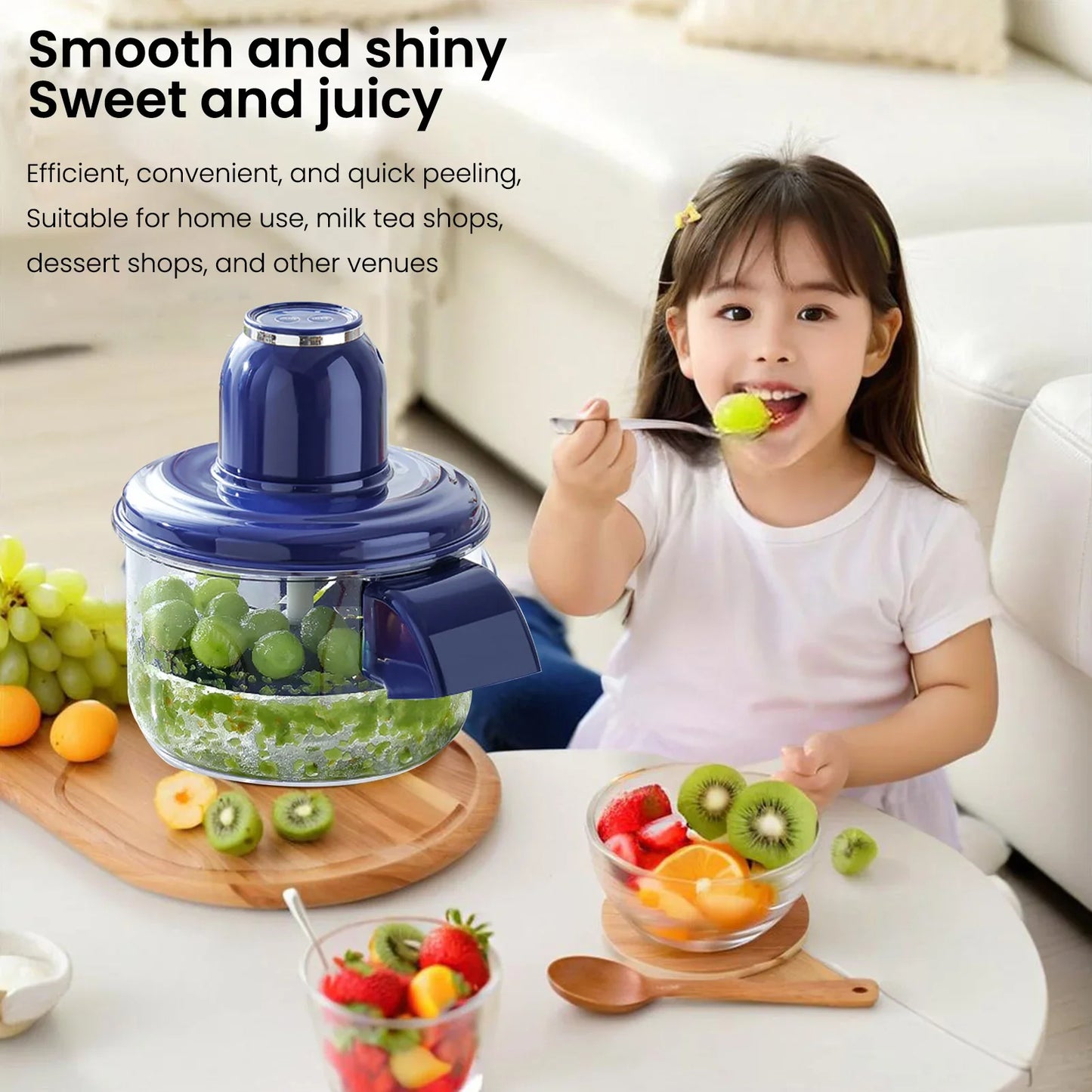 Child eating fruit with a food chopper on a table, surrounded by fruits.
