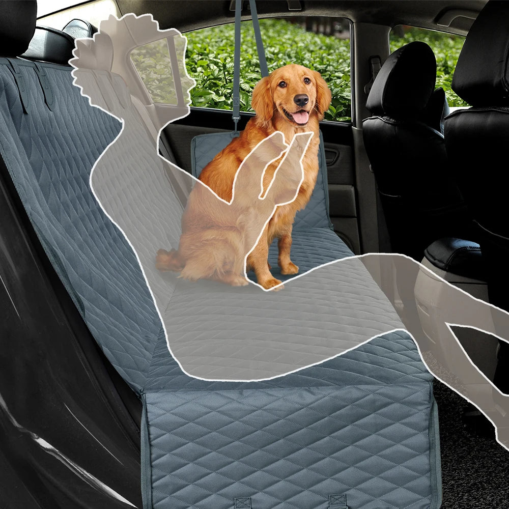 Dog sitting on a car seat cover in a vehicle