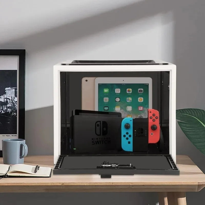 fridge lock box display case with electronic devices on a desk