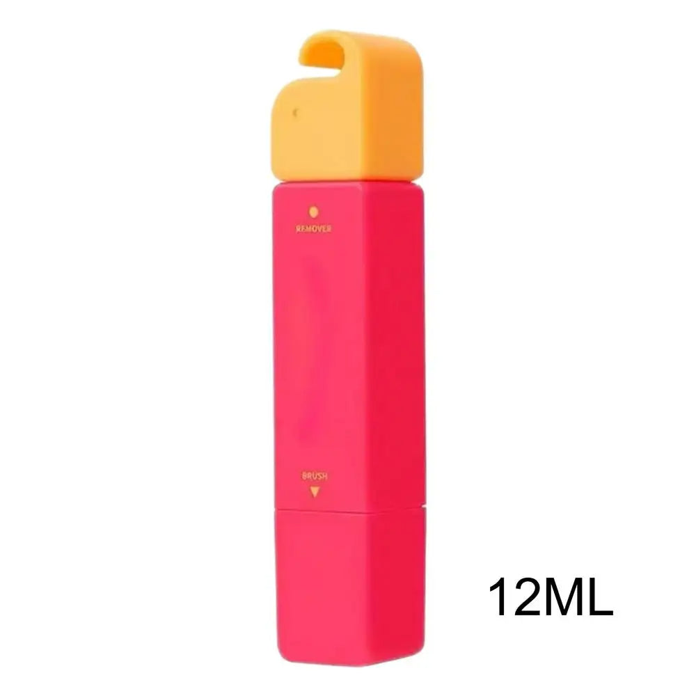 Small red stain remover pen with yellow cap on a white background