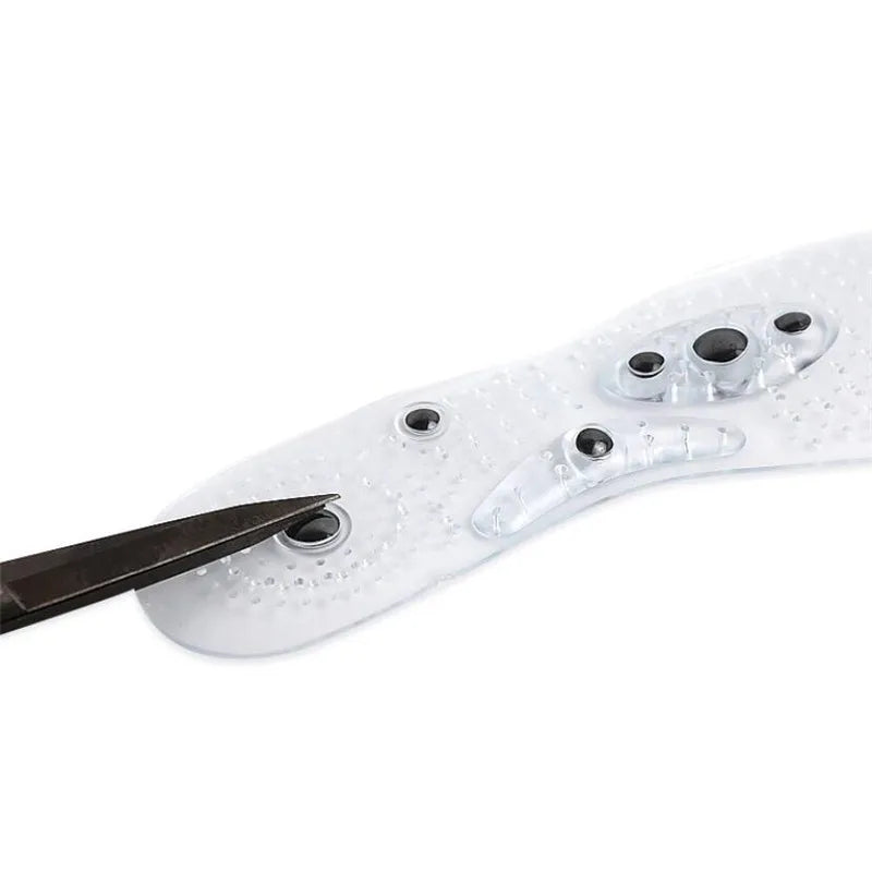 Close-up of a white foot insoles with black dots