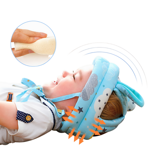 Baby wearing a blue Safety Anti-Collision Helmet with star and cloud pattern, lying on a white background.