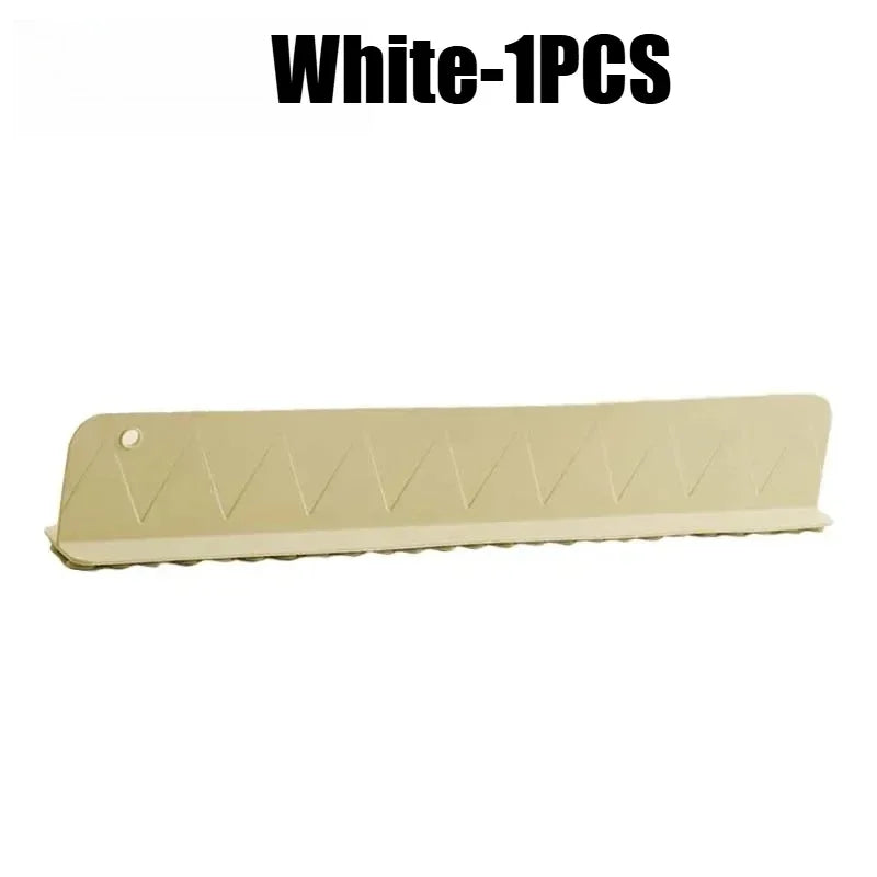 Beige kitchen sink protector with triangular patterns on a white background