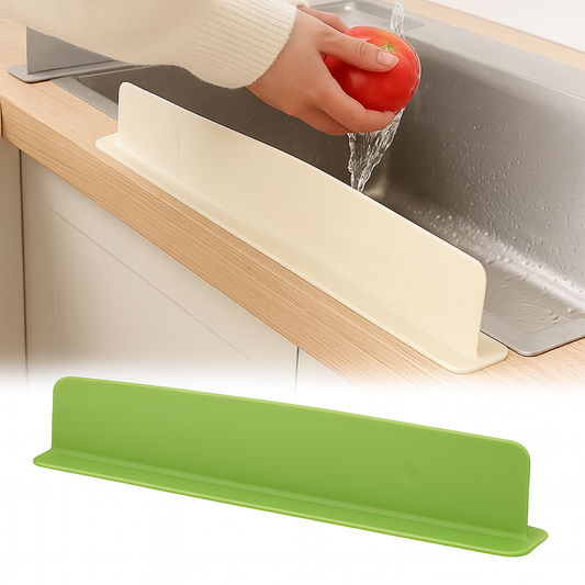 Green kitchen sink protector with a tomato being rinsed under running water.